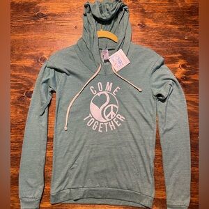 NWT Super Love Tees Women’s Graphic “Come Together” Green Hoodie. Size Small.